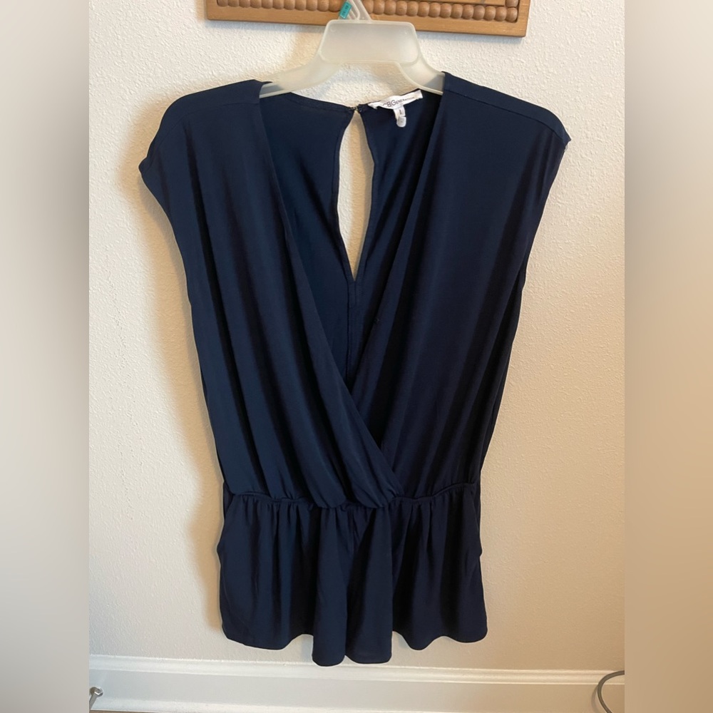 BCBGeneration shorts romper size L. Plunge neckline with cap sleeves & pockets